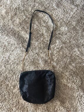 Black Logo Crossbody Bag with Gold Chain and Adjustable Strap
